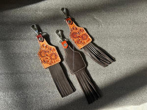 Nouveau véritable fabriqué à la main couleur véritable cuir repoussé mignon charmant gland porte-clés Offre Spéciale Style occidental moderne Floral porte-clés - Product Image 5