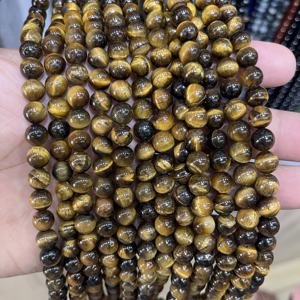 ลูกปัดหินไทเกอร์อายธรรมชาติขนาด 8 มม. แกะสลักอย่างเป็นมิตรต่อสิ่งแวดล้อม ร้อยเป็นเส้น สีน้ำตาลทองขัดเงา สำหรับทำเครื่องประดับ สร้อยข้อมือ - Product Image 2