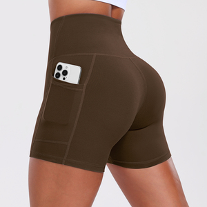 Shorts de yoga taille haute couleur unie avec poches, effet ventre plat, en nylon sans couture, très extensible, pour femme, fitness et sport - Product Image 5