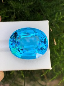 พลอยบลูโทแพซธรรมชาติทรงรี รับรองโดย IGI  หินหลวมสีอ่อนจาก Zubeda Gems Rajasthan สำหรับทำเครื่องประดับ ขายส่ง - Product Image 3