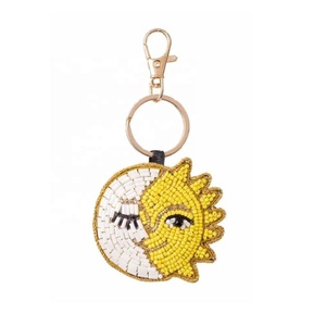 JANDAOOD GB554 Breloque Perles de Verre Soleil et Lune – Tendance Légère et Élégante pour Sacs et Voitures de Filles - Product Image 1