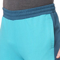 Pantalon de survêtement en polyester de couleur unie pour hommes, taille élastique, poches latérales, style décontracté, style automne