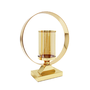 Dual arm metal candle holder with symmetrical design sturdy frame and refined finish for centerpiece styling - Product Image 1