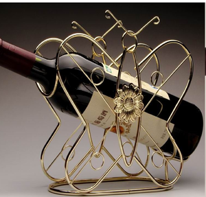 Ensemble de porte-bouteilles à vin en forme d'anneau orbital métallique doré moderne, sur un socle plat robuste, disponible à prix de gros. - Product Image 5