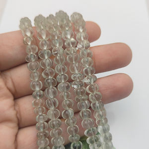 ลูกปัดอะเมทิสต์สีเขียวธรรมชาติรูปฟักทองขนาด 5–7 มม. ลูกปัดควอตซ์แกะสลักรูปเมลอน ขายส่งอุปกรณ์อัญมณี - Product Image 1