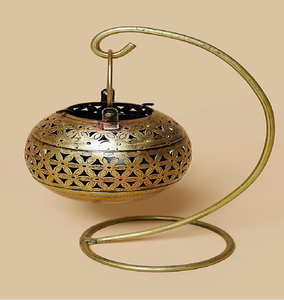 Antique <b>brass</b> spherical desk <b>lantern</b> on curved metal stand with petal patterns, available at wholesale prices. - Product Image 1