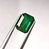 Pierre précieuse naturelle vert émeraude de 2,15 carats, taille émeraude, provenance Zambie, 6,7x8,7x5,4mm, pierre lâche, avec jeu de couleurs/effet de feu, qualité saphir, International for