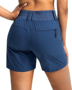 Shorts de sport taille haute pour femmes, couleur unie, séchage rapide, coupe sportive avec poches, tricoté en spandex et polyester - Product Image 3
