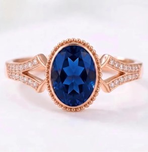 Bague de fiançailles vintage en argent sterling 925 plaqué or rose avec saphir bleu ovale de qualité supérieure pour femmes, vente en gros - Product Image 1