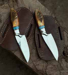 Cuchillo profesional de alta calidad para desollar ciervos, de acero con alto contenido de carbono, hoja fija, con funda de cuero turquesa. - Product Image 1