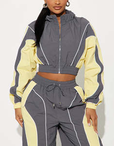 Conjunto deportivo de nailon para mujer, con logotipo personalizado, para invierno, estilo informal, para correr, entrenar, con cintura elástica, cortavientos. - Product Image 3