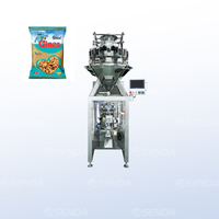 Machine à emballer automatique de granules avec distributeur de tasses à mesurer pour noix/noix/snack