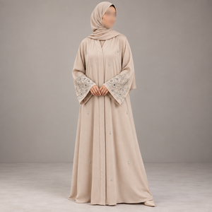Abaya classique ivoire avec broderie florale sur les manches et poignets fluides |   Robe longue musulmane modeste pour un port quotidien élégant - Product Image 1