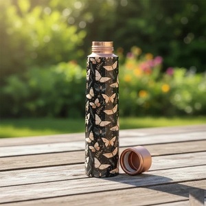 Botella de Agua Artesanal de Cobre Puro Negro con Diseño de Mariposa, Portátil para Exteriores con Tapa - Product Image 1