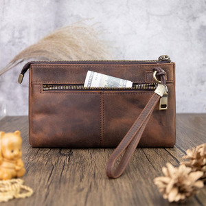 Bolso de mano de cuero de primera calidad con cierre seguro, múltiples ranuras para tarjetas, bolsillo para teléfono y correa desmontable para uso diario. - Product Image 4