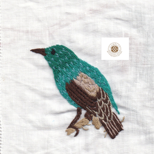 Peacock embroidered napkin, enhances elegance for premium table <b>settings</b>. - Product Image 1