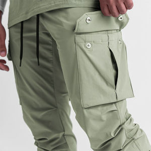 2026 Luxury Regular Fit Breathable Mid Waist Solid Color Fashion Pocket Quick Dry Canvas Windbreaker Sportswear <b>Trouser</b> Men's - Product Image 4