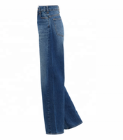 Vaqueros de mezclilla personalizados al por mayor para mujer, estilo Y2K, informales, de corte regular, cintura alta, pierna ancha, transpirables, con lazo, agujeros y borlas de leopardo.