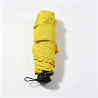 Parapluie de voyage pliable 5 sections 19 pouces, ouverture manuelle, pongé noir UPF50, fibre de verre, léger 207g, sangle, logo personnalisé OEM