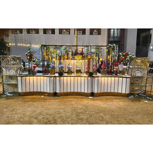 Comptoir de buffet pour mariage indien, souvent éclairé par des lumières et décoré de finitions dorées ou à motifs. - Product Image 3
