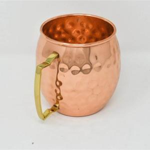 Taza de cobre hecha a mano con asa de latón, acabado martillado, estilo vintage, resistente al calor, para bebidas calientes, uso en fiestas, precio económico. - Product Image 1