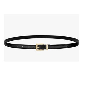 Cinturón minimalista de cuero para mujer con líneas limpias, ideal para opciones de vestuario sencillas y elegantes. - Product Image 1