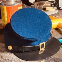 Gorra de artillería Union estilo Civil War, diseñada como una reproducción para coleccionistas o recreadores históricos.