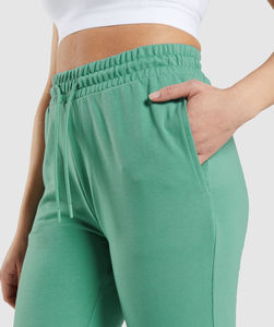 Pantalones de chándal de tela de punto con encaje de cintura alta y elástica para mujer, con logotipo personalizado, serigrafía OEM, gran oferta - Product Image 4