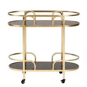 Chariot de service ovale en métal avec cadre doré et roues verrouillables, style glamour, design durable pour les fêtes - Product Image 3