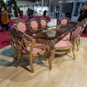 European glass top <b>dining</b> table set featuring silver ornate cut-out back <b>chairs</b> and pedestal base, available at wholesale prices - Product Image 3