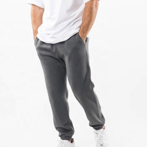 Pantalones deportivos para hombre, lisos, para fitness, correr, gimnasio, ropa deportiva, pantalones jogger de forro polar, con múltiples bolsillos, de algodón, extragrandes. - Product Image 1