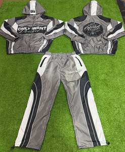 Manufacturer Unisex Sweatsuit <b>Zip</b> <b>up</b> <b>Jacket</b> and Pants Set Reflective Color Block Custom Polyester Nylon Windbreaker Tracskuit - Product Image 3