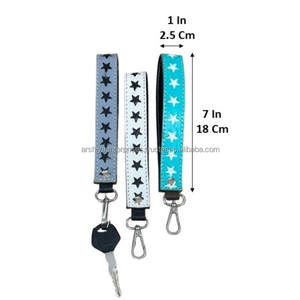 Porte-clés en cuir de vachette véritable fait main, motif étoile, design premium, avec dragonne, pour unisexe - Collection 2026 - Product Image 2