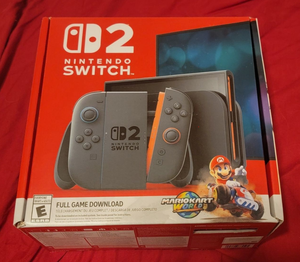 Console Nintendo Switch 2 Grise avec Accents Orange, Manettes Style Joy-Con, Jeu Complet Mario Kart World à Télécharger, ESRB E - Product Image 1