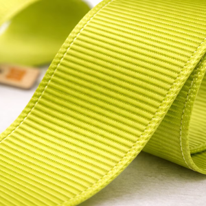 ริบบิ้นโกรเกรนสีเขียวอมฟ้าขนาด 38 มม. ของนีลกามัล อินดัสทรีส์ ทนต่อการหดตัว ผลิตจากโพลีเอสเตอร์ 100% สำหรับตกแต่ง ตัดเย็บเสื้อผ้า และอุปกรณ์เสริม - Product Image 1