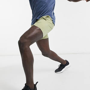 กางเกงขาสั้นผู้ชายดีไซน์คุณภาพสูง เอวยางยืดพร้อมเชือกผูกด้านใน กระเป๋าข้าง ความยาวปานกลาง ทรงเข้ารูป ดีไซน์ทันสมัย สำหรับขายส่ง - Product Image 4