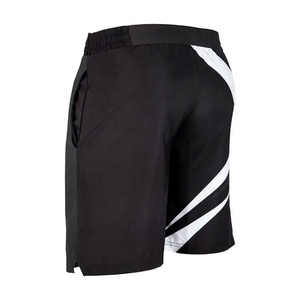 กางเกงชกมวย MMA UFC พิมพ์ลายโลโก้ตามสั่ง ด้วยเทคนิคการพิมพ์แบบรีดร้อน ผลิตจากโพลีเอสเตอร์ 100% คุณภาพดี ดีไซน์สำหรับผู้ชาย - Product Image 2