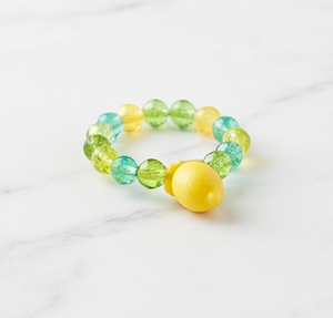 Joli porte-serviette en forme de citron avec perles vertes, bleues et jaunes pour les fêtes sur le thème des fruits et la décoration de table - Product Image 1