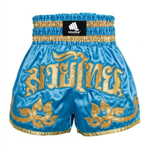 กางเกงมวยไทยปักลายด้านหน้าสีฟ้าและสีทองแบบ OEM สำหรับมืออาชีพ กางเกงคิกบ็อกซิ่งสำหรับยูนิเซ็กซ์ กางเกงมวย MMA - Product Image 1
