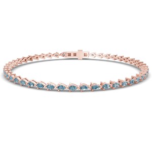 Bracelet tennis original en or avec diamants de laboratoire bleu glace taille poire Serene, 3 carats au total. Bracelet en diamant véritable en or 10 carats - Product Image 1