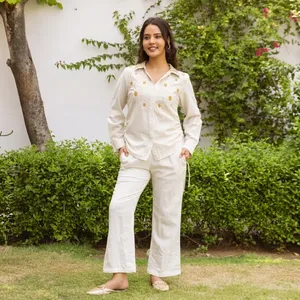 Ensemble deux pièces en coton blanc pour femmes, chemise boutonnée à manches longues, col rabattu, pantalon évasé, tenue décontractée pour le printemps et l'été - Product Image 1