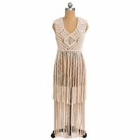 Robe-veste bohème faite à la main en macramé avec longues franges et pompons sans manches