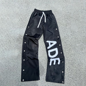 กางเกงแทร็คแพนท์ผ้าไนลอนปักลายโลโก้คุณภาพสูงแบบสั่งทำพิเศษสำหรับผู้ชาย สไตล์สตรีทแวร์ กระดุมแป๊ก ทรงจ็อกเกอร์ ขากว้าง - Product Image 3