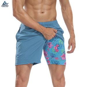 Pantalones cortos deportivos para hombre con forro de compresión, entrepierna de 7 pulgadas, muy vendidos, con logo propio, pantalones cortos de gimnasio para hombre - Product Image 1
