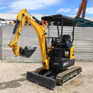 Compact Used 3000kg Yellow Digger with Front Mounted Dozer Blade and Rubber Tracks for Precise Residential Grading - Product Image 1