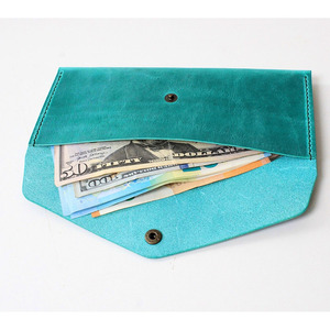 Sobre para efectivo de cuero genuino hecho a mano con cremallera segura, múltiples bolsillos, perfil compacto, artesanía premium y elegante. - Product Image 1