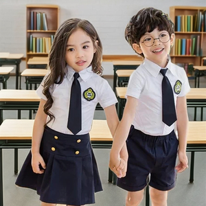 Uniforme scolaire primaire en gros ODM. Ensemble chemise blanche en polyester/coton unisexe pour enfants et bas bleu marine. Tailles et couleurs personnalisées en gros - Product Image 1