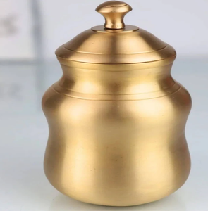 Exquisite hammered brass <b>pot</b> featuring a glossy polished finish on a woven base. Available at wholesale price. - Product Image 2