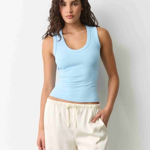 Camiseta sin mangas transpirable con cuello redondo para mujer, ideal para fitness, 100% algodón tejido, estilo deportivo, color liso. - Product Image 4