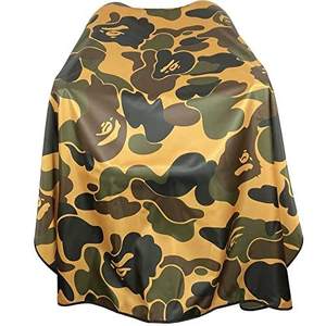 Cape de coiffure IKZARSA - Utilisation professionnelle en salon, taille réglable, design rayé durable, 140x160cm, cape en polyester non tissé - Product Image 1
